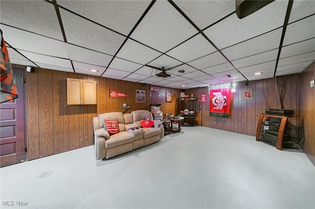 living room featuring wooden walls