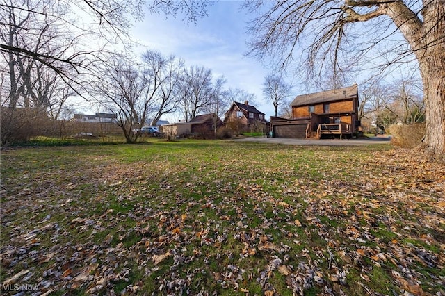 view of yard featuring a garage