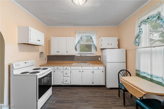 kitchen featuring white appliances, dark wood-type flooring, a textured ceiling, white cabinetry, and sink