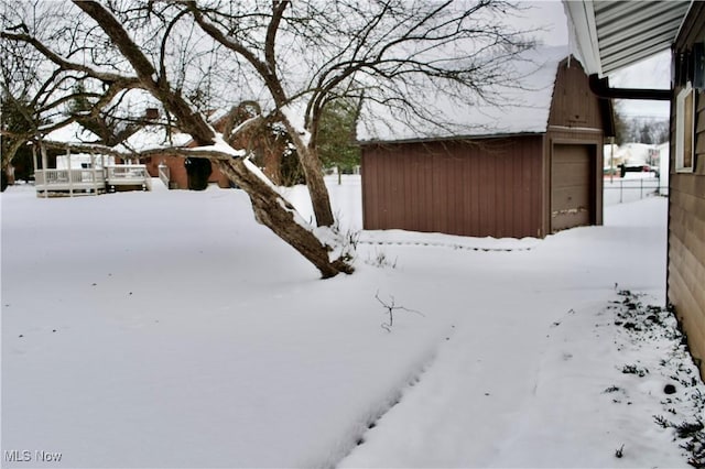 view of yard covered in snow