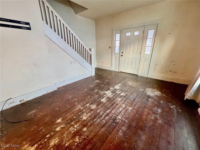 entrance foyer with dark hardwood / wood-style flooring