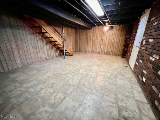 basement with wooden walls