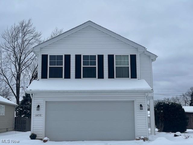 view of front property with a garage