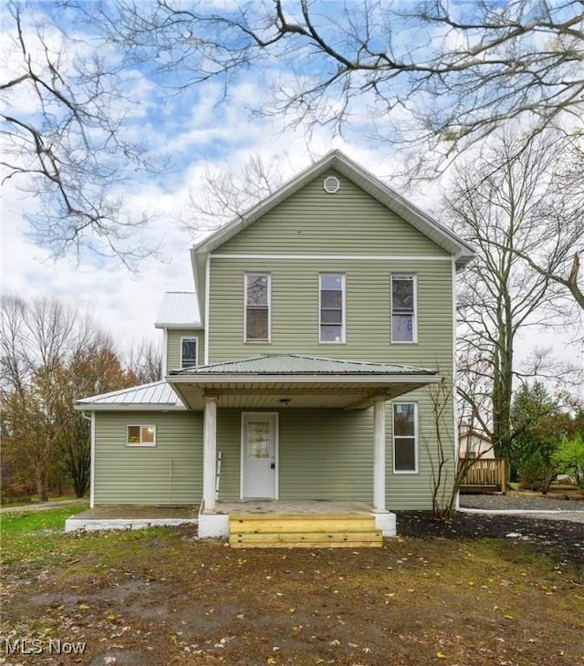 front facade with a porch