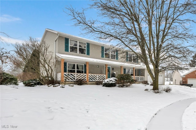 view of property featuring covered porch