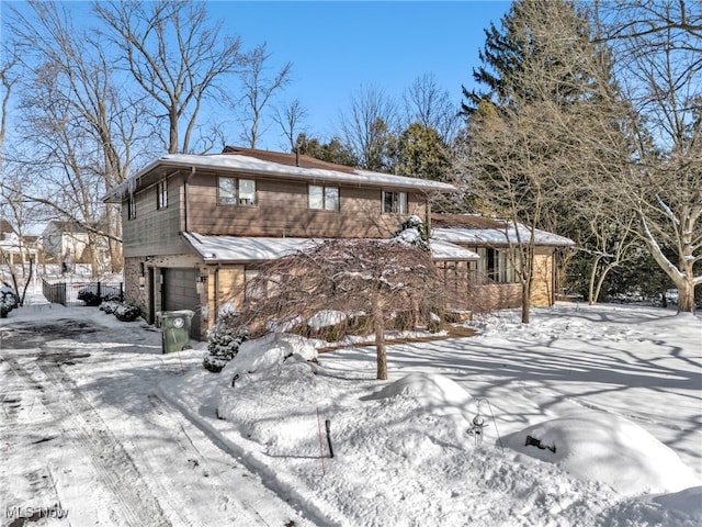 view of front of property with a garage