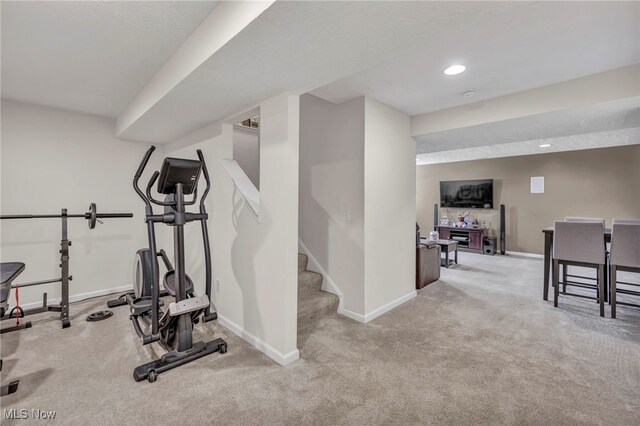 workout room with light carpet