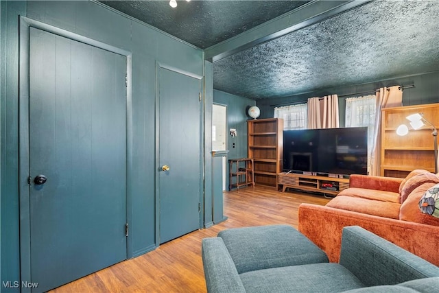 living room with wood-type flooring