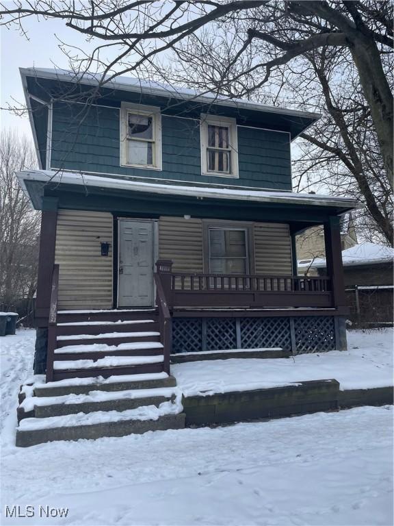 view of front of property featuring covered porch