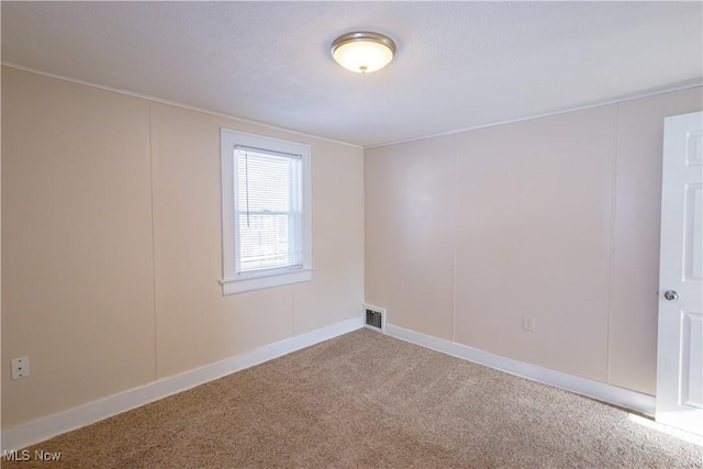 view of carpeted spare room