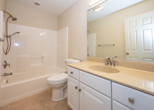 full bathroom featuring toilet, tile patterned flooring, washtub / shower combination, and vanity