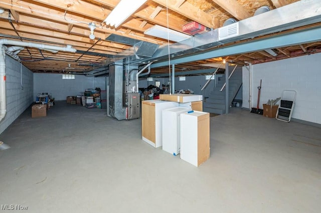 basement featuring heating unit