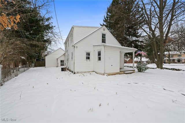 view of snow covered property