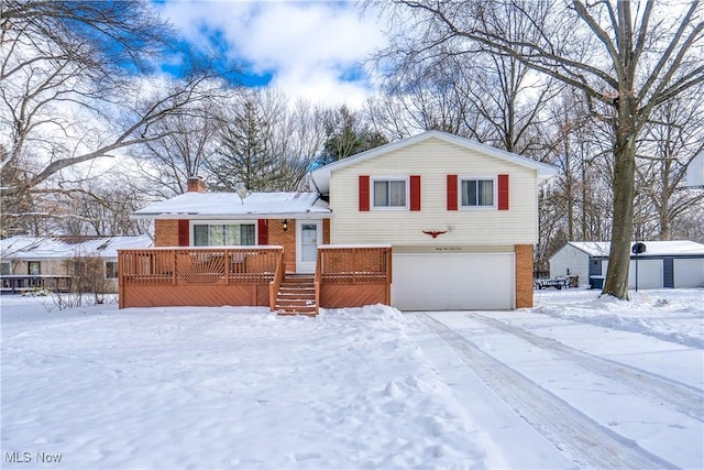 split level home featuring a garage