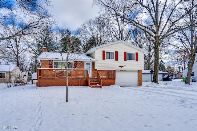 split level home featuring a garage