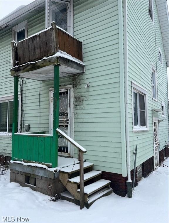 exterior space with a balcony