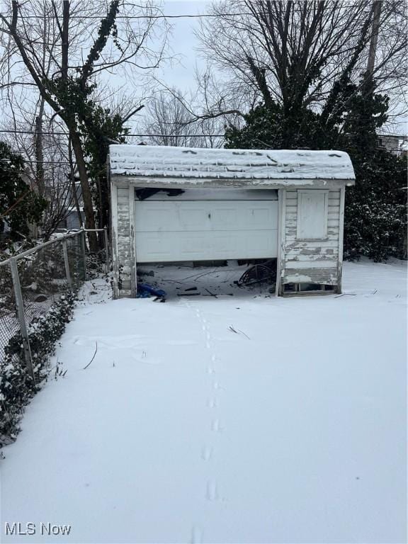 view of snow covered garage