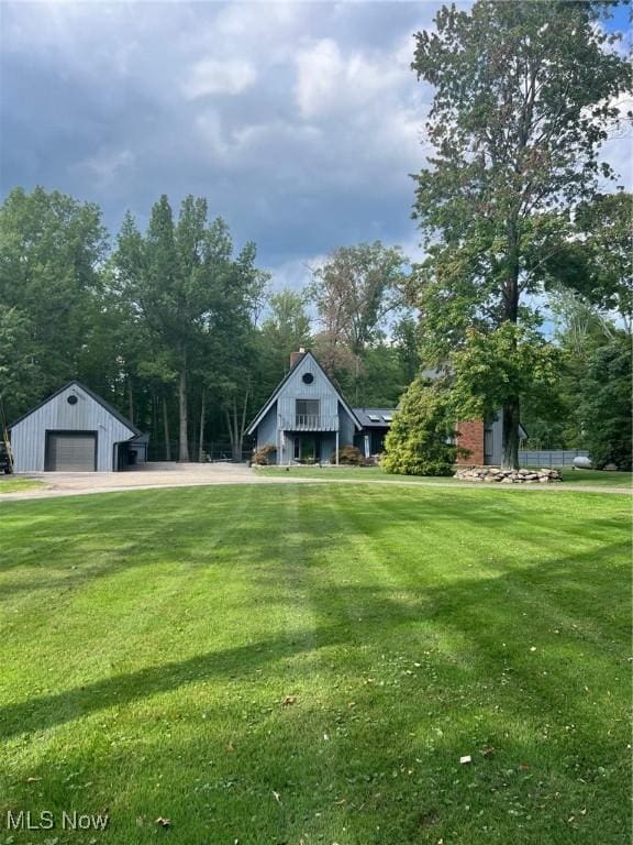 view of yard with a garage