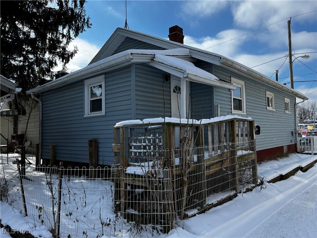 view of snow covered property