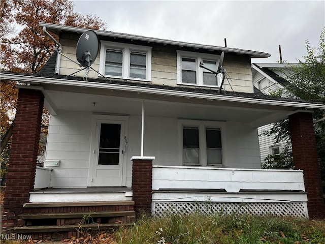 view of front of property featuring covered porch