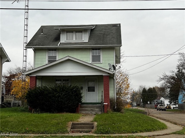 front of property featuring a front lawn