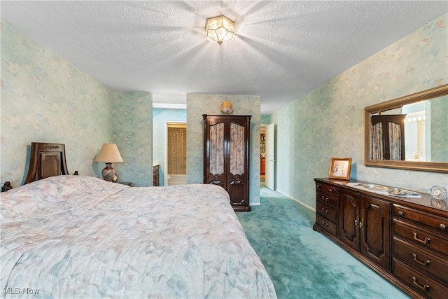 carpeted bedroom with a textured ceiling