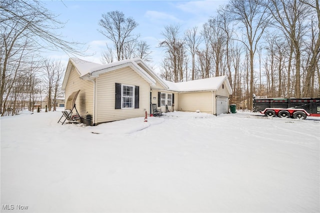 single story home with a garage