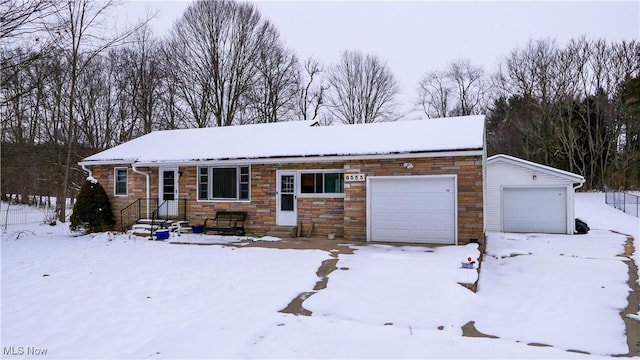 ranch-style house featuring a garage