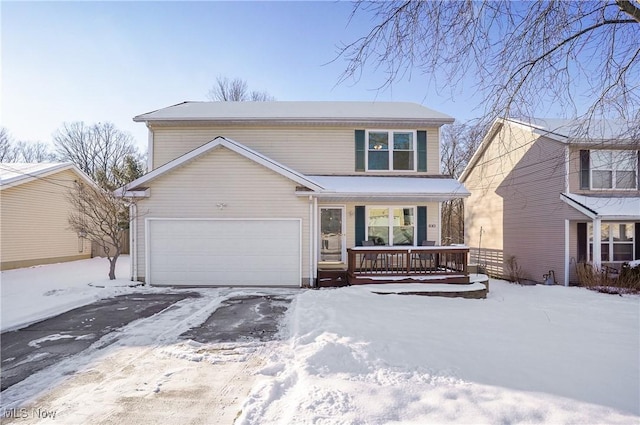 front of property featuring a garage and a porch