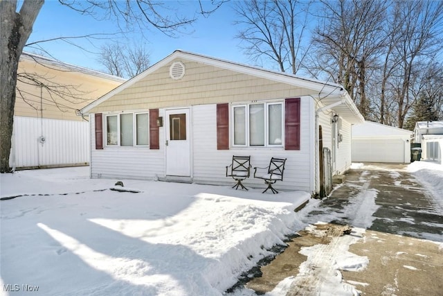 bungalow featuring a garage