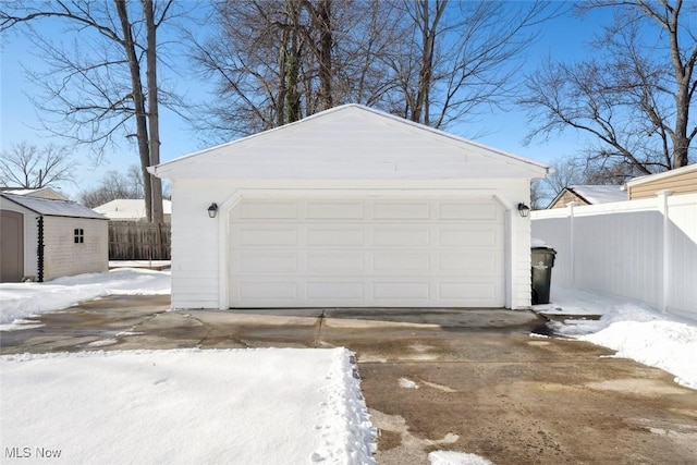 view of snow covered garage