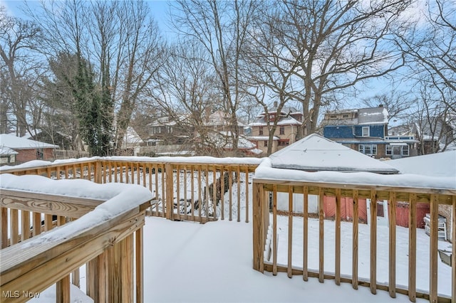 view of snow covered deck