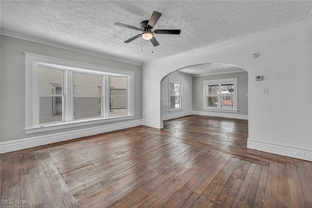 unfurnished room with ceiling fan, crown molding, a textured ceiling, and hardwood / wood-style flooring