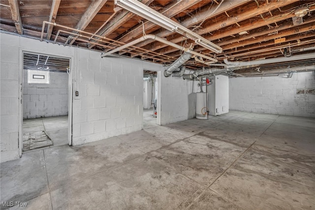 basement featuring water heater