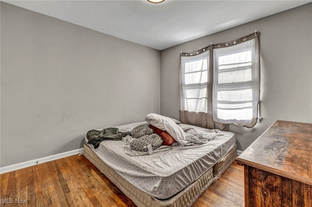 bedroom featuring hardwood / wood-style floors