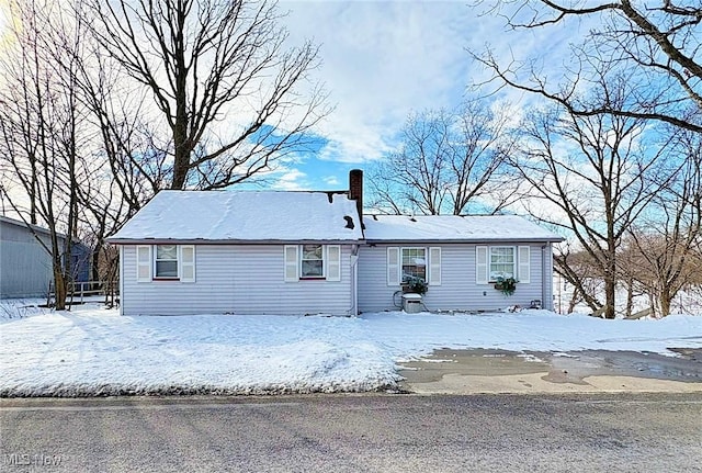 view of snow covered house