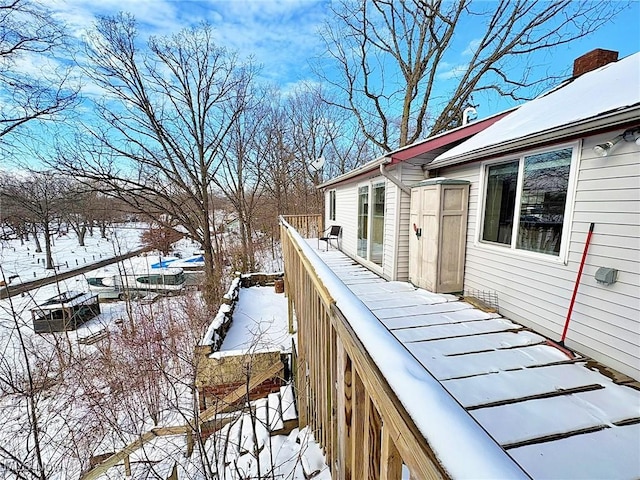 view of snow covered deck