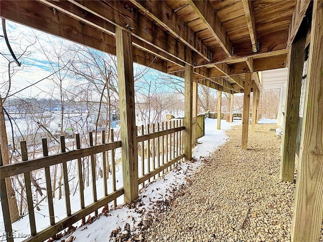 view of snow covered deck