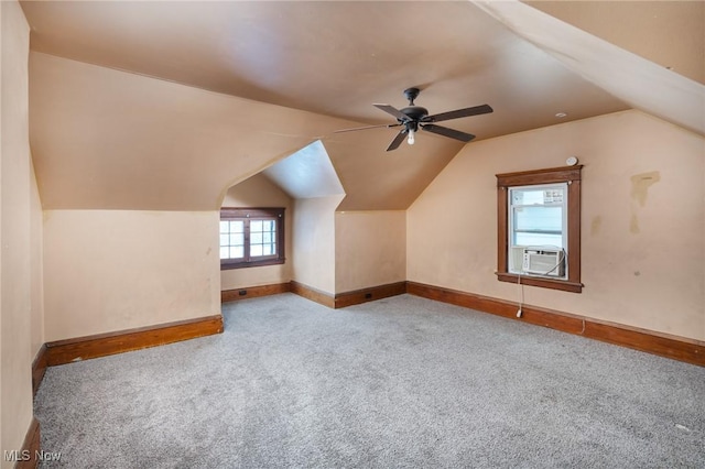 bonus room with ceiling fan, light carpet, cooling unit, and lofted ceiling