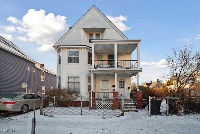 view of front facade featuring a porch and a balcony