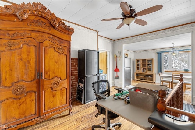 office with ceiling fan, ornamental molding, and light hardwood / wood-style flooring