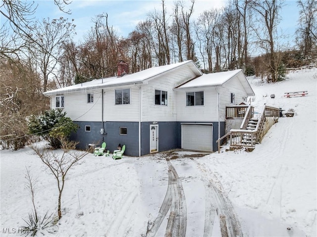 view of front of home with a garage