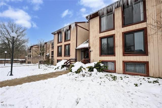 view of snow covered property