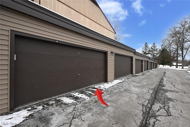 view of snow covered garage