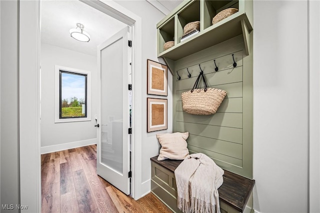 mudroom with hardwood / wood-style floors