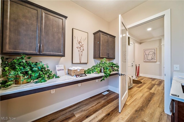 hallway featuring light hardwood / wood-style flooring