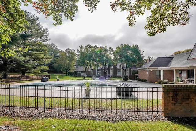 view of community featuring a lawn