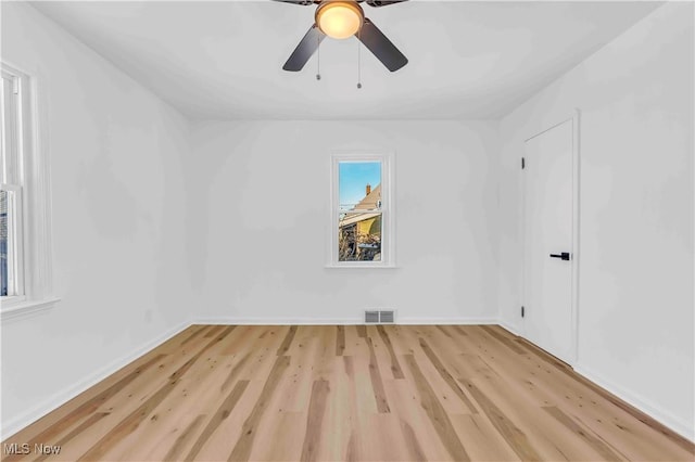 unfurnished room featuring ceiling fan and light hardwood / wood-style flooring