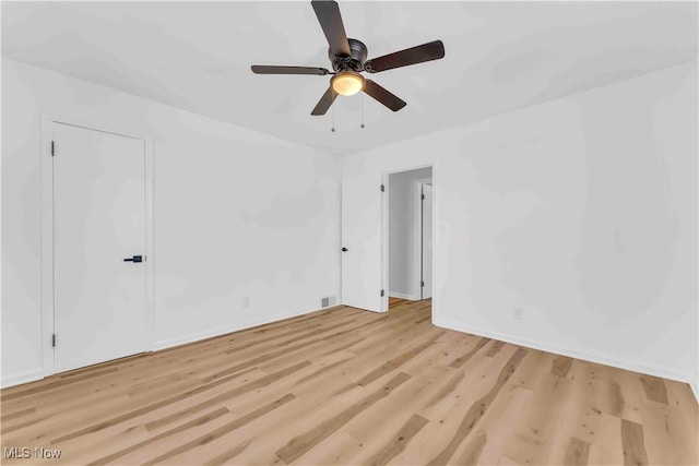 interior space with ceiling fan and light hardwood / wood-style flooring