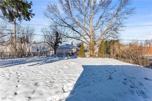 view of snowy yard